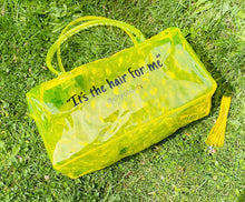 Load image into Gallery viewer, Yellow &quot;Spend Da Night&quot; bag. A clear pvc bag is made of vinyl and has a zipper closure.
